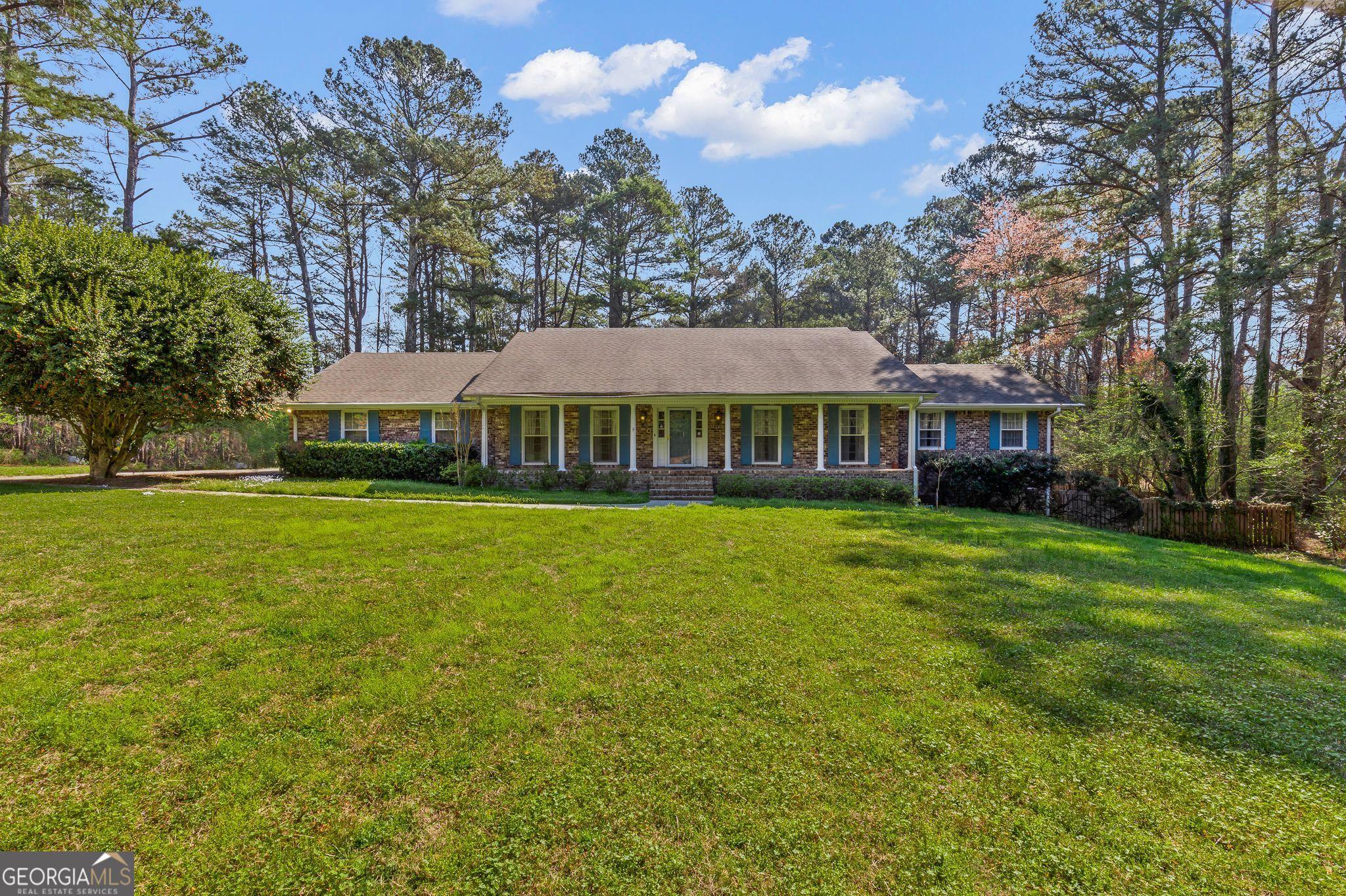 Photo one of 1121 Highway 314 Fayetteville GA 30214 | MLS 10261807G