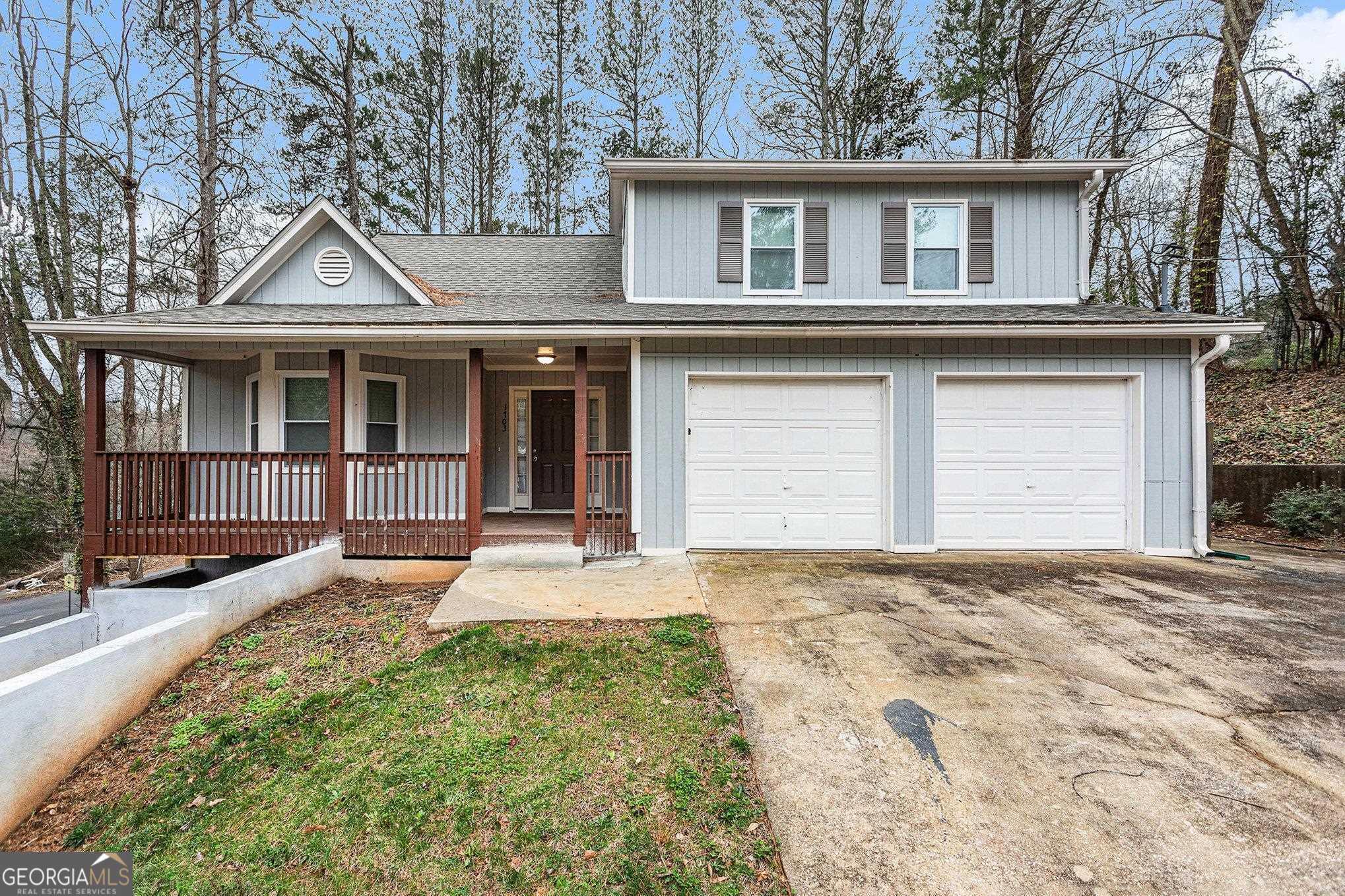Photo one of 1703 Canberra Dr Stone Mountain GA 30088 | MLS 10262253G