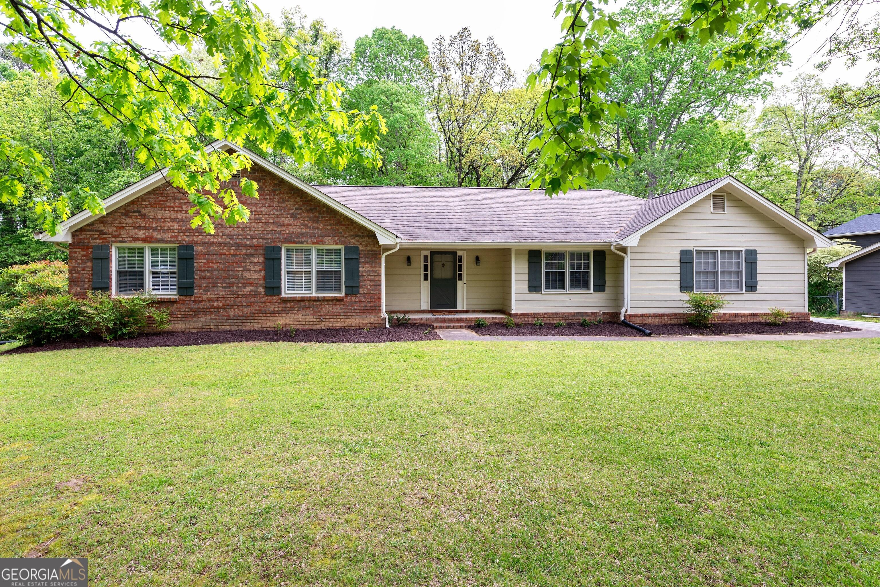 Photo one of 1607 Ramblewood Way Snellville GA 30078 | MLS 10284075G