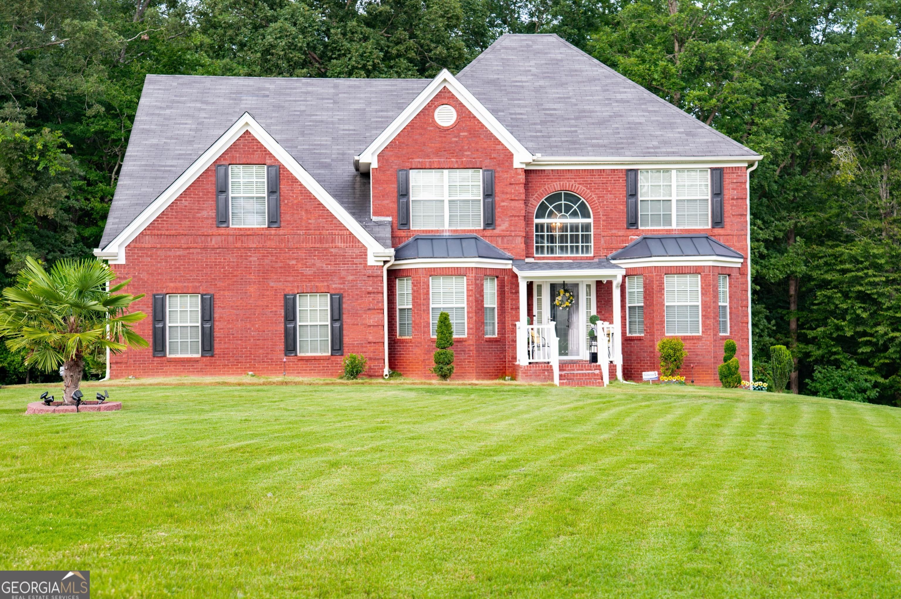 Photo one of 132 Sunflower Meadows Dr Mcdonough GA 30252 | MLS 10349482G