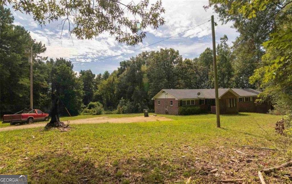 Photo one of 6640 E Stubbs Atlanta GA 30349 | MLS 20046322