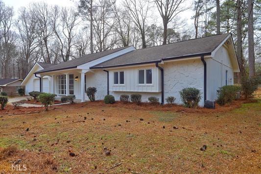 Photo one of 3392 Manchester Sw Dr Lilburn GA 30047 | MLS 7017351