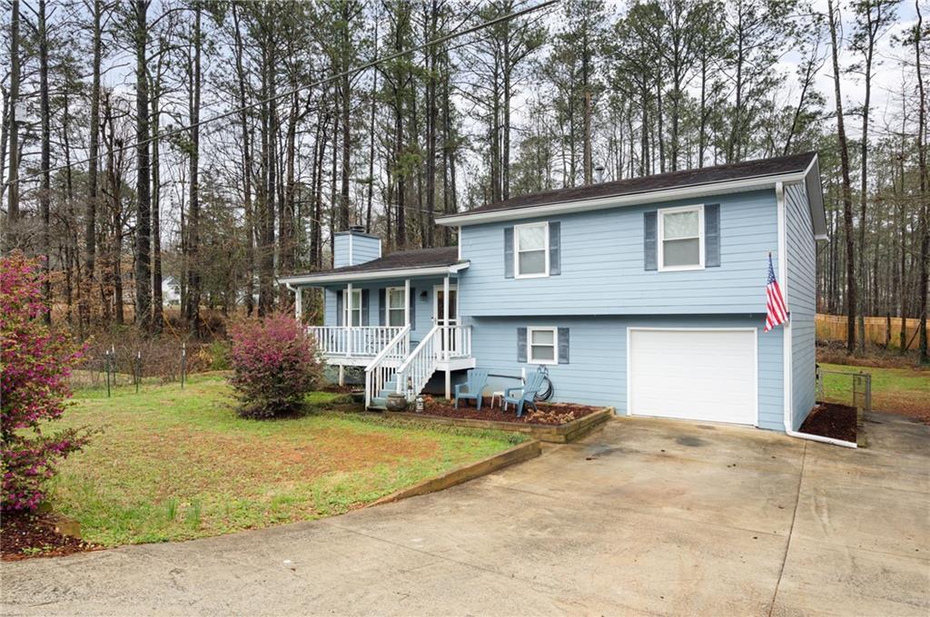 Photo one of 2409 Anderson Mill Rd Austell GA 30106 | MLS 7348736F