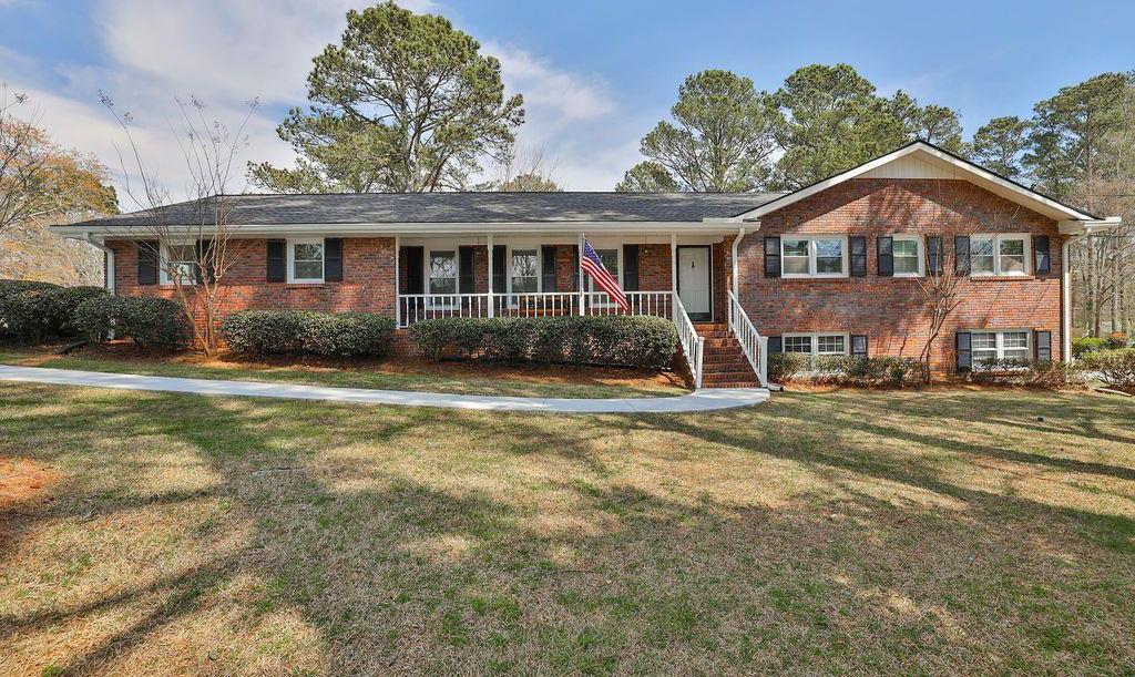 Photo one of 2232 Timber Sw Ln Snellville GA 30078 | MLS 7353630F