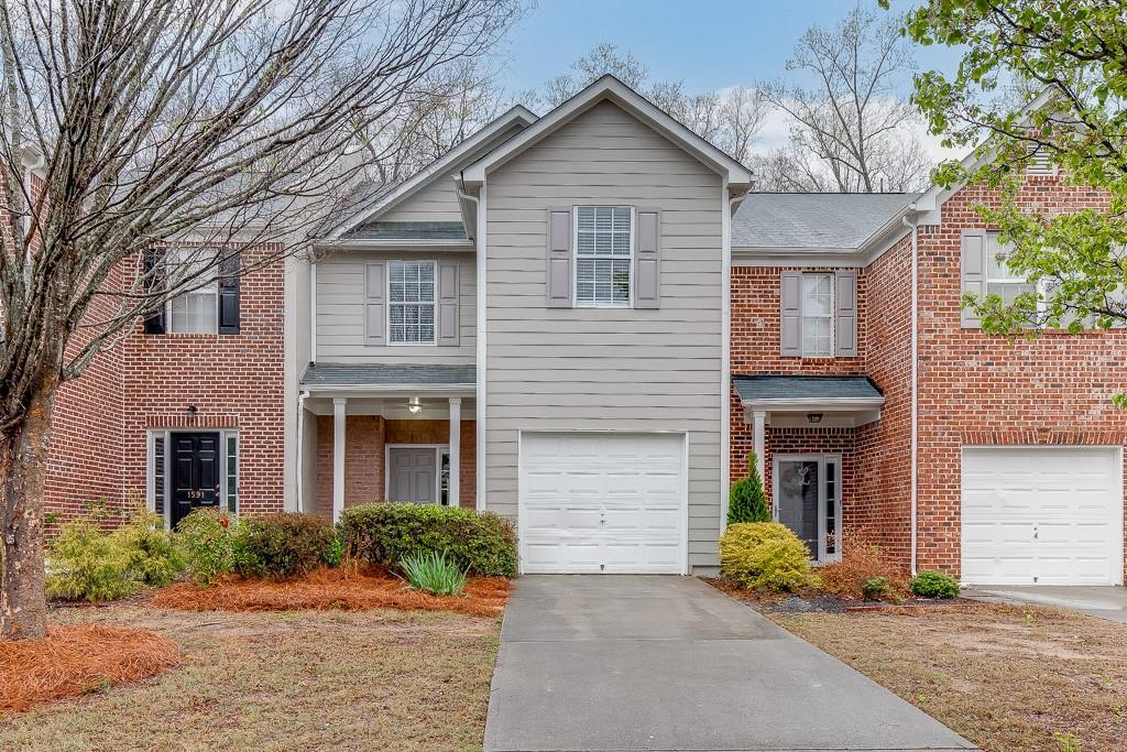 Photo one of 1589 River Main Ct Lawrenceville GA 30046 | MLS 7359684F