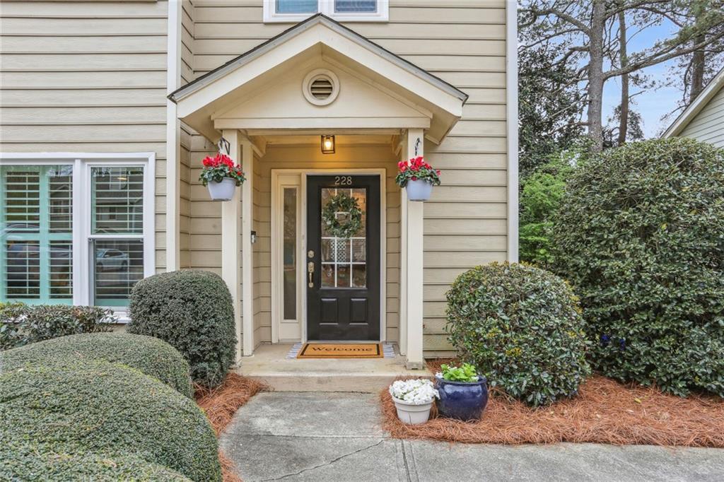 Photo one of 228 Peachtree Hollow Ct Sandy Springs GA 30328 | MLS 7361627F