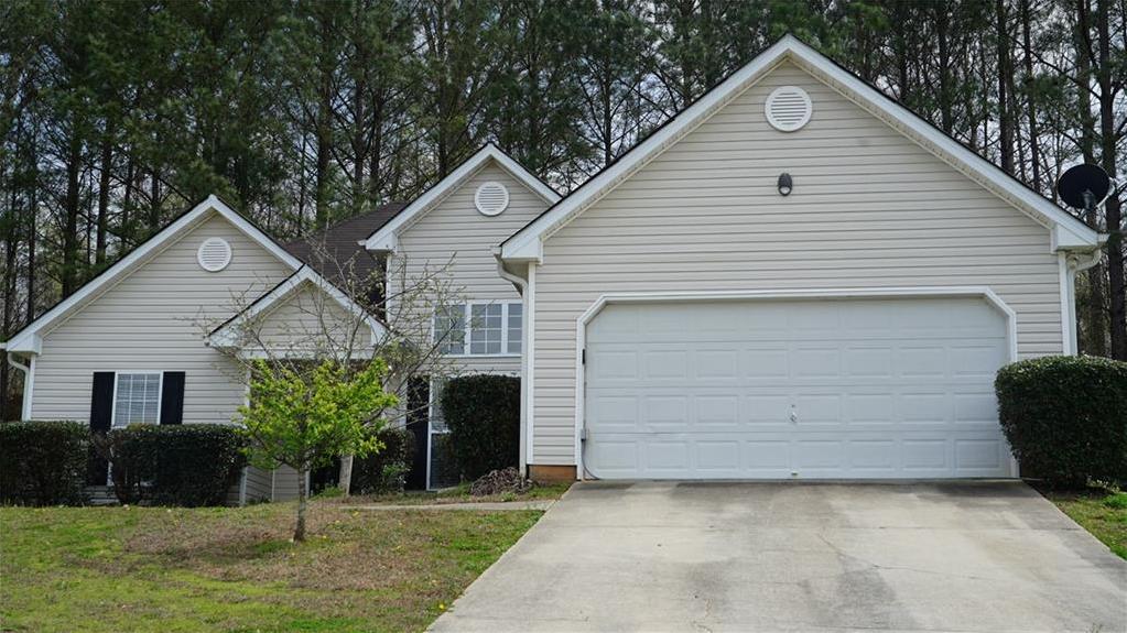 Photo one of 4458 James Wade Dr Snellville GA 30039 | MLS 7364644F