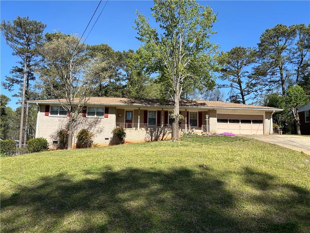 Photo one of 5669 Forest Sw Dr Lilburn GA 30047 | MLS 7364741F