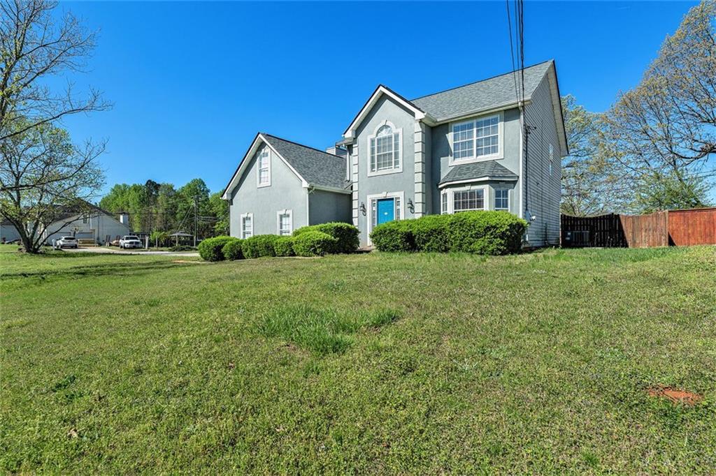 Photo one of 4155 Flakes Mill Manor Ln Ellenwood GA 30294 | MLS 7365546F