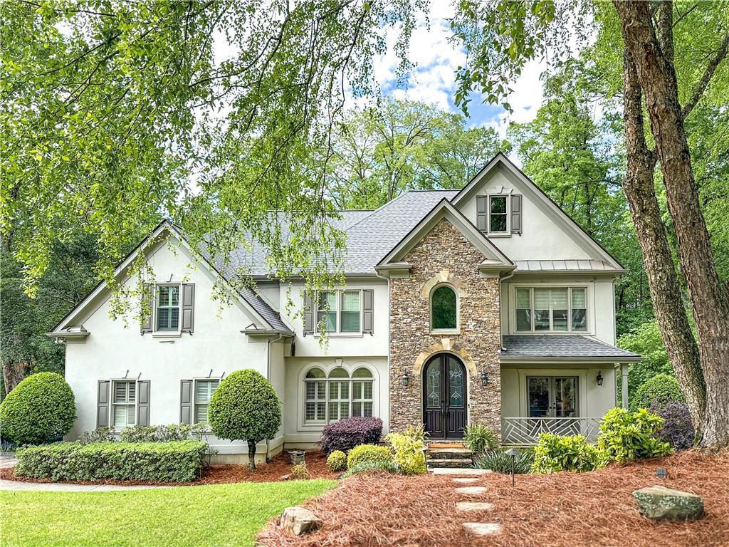 Photo one of 355 Hurst Bourne Ln Johns Creek GA 30097 | MLS 7366147F