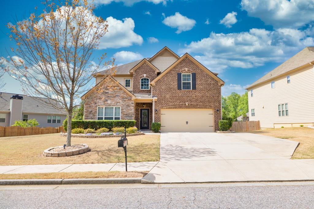 Photo one of 2170 Cain Commons Dr Dacula GA 30019 | MLS 7366158F