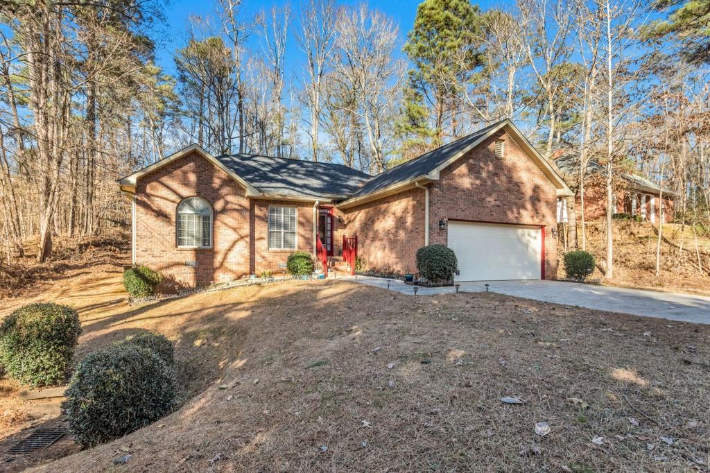 Photo one of 5310 Somerlane Trl Atlanta GA 30349 | MLS 7368417F