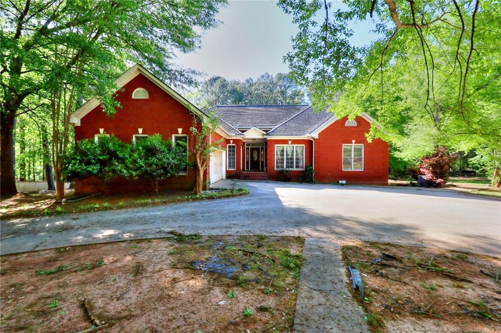 Photo one of 5618 Highway 212 Covington GA 30016 | MLS 7369032F