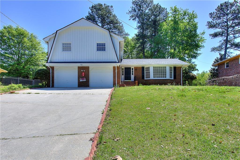 Photo one of 909 Holly Hedge Rd Stone Mountain GA 30083 | MLS 7370004F