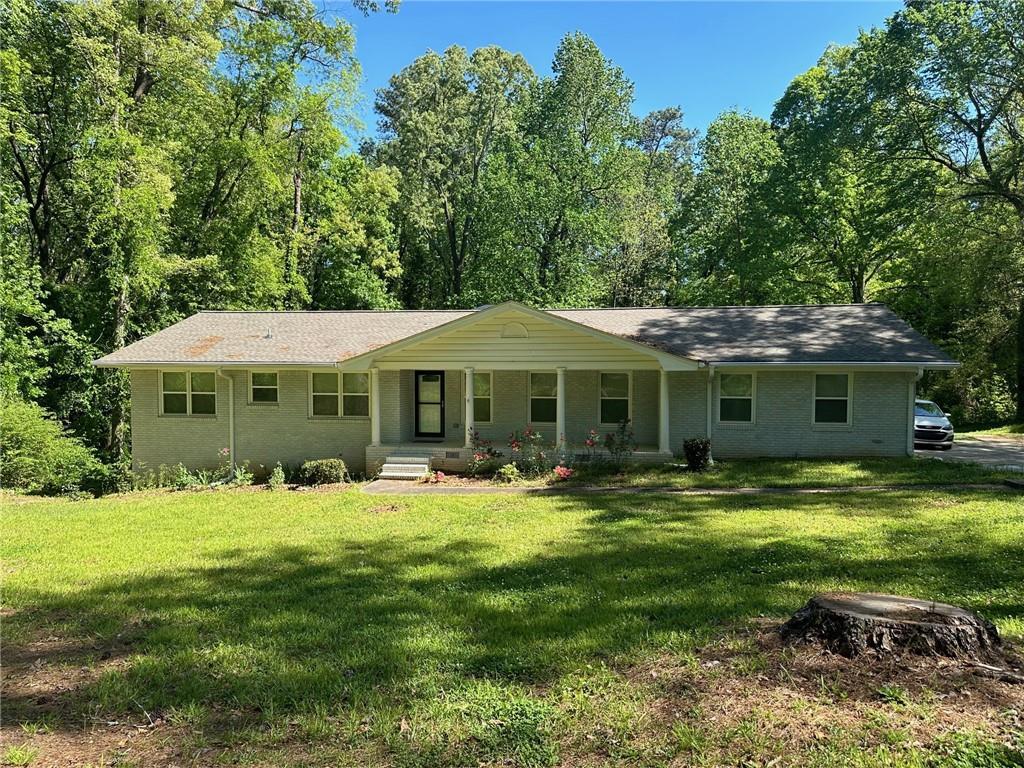 Photo one of 1054 Rowland Rd Stone Mountain GA 30083 | MLS 7370031F