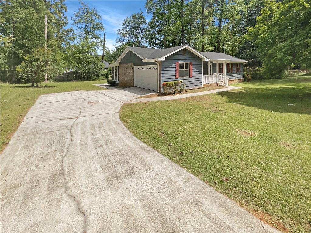 Photo one of 608 Field Cliff Dr Stone Mountain GA 30087 | MLS 7370483F