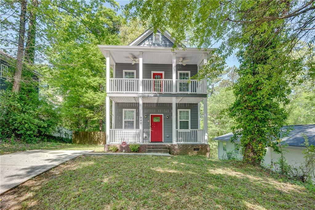 Photo one of 940 N Eugenia Nw Pl Atlanta GA 30318 | MLS 7370703F