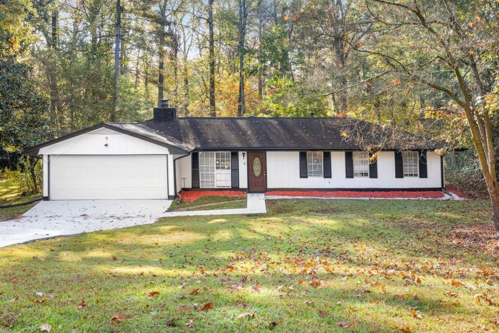 Photo one of 569 Hawkeye Dr Stone Mountain GA 30083 | MLS 7371064F