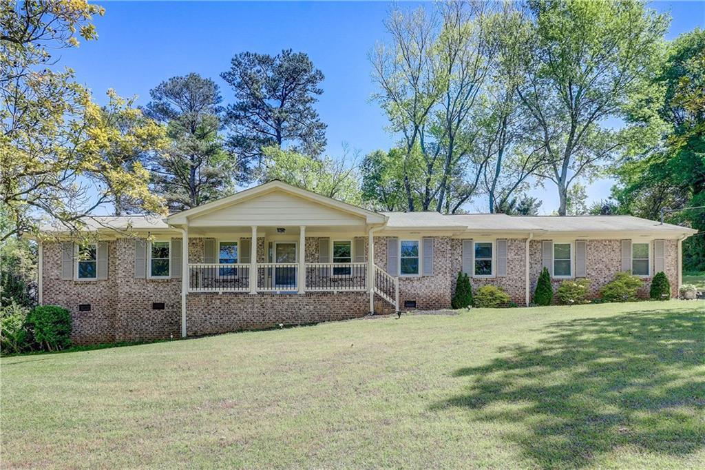 Photo one of 1700 Pine Cir Lawrenceville GA 30044 | MLS 7371314F