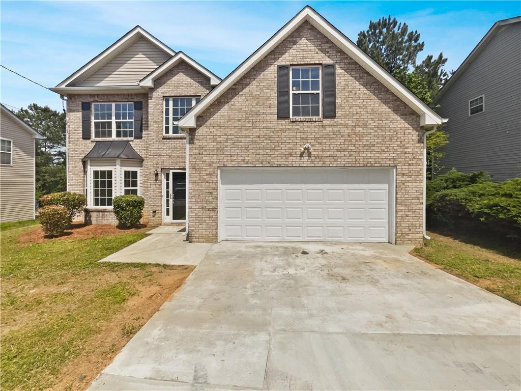 Photo one of 7058 Red Maple Ln Lithonia GA 30058 | MLS 7372154F