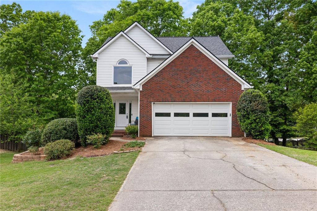 Photo one of 2200 Ashley Crossing Ct Lawrenceville GA 30043 | MLS 7376644F