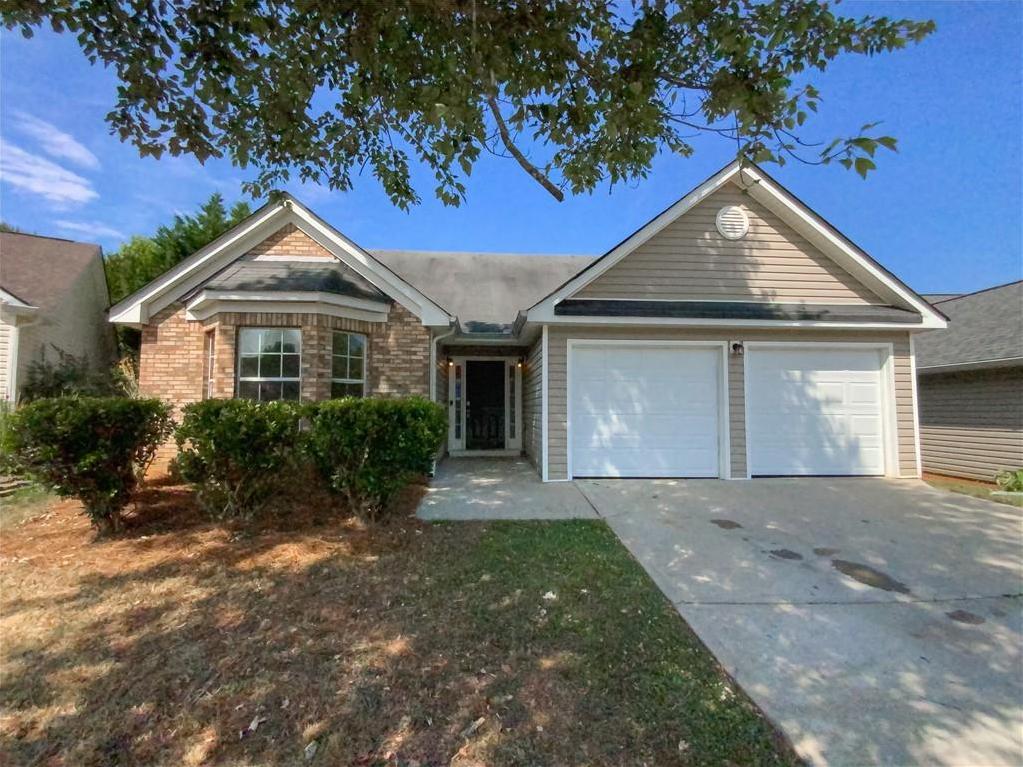 Photo one of 50 Ivans Cir Covington GA 30016 | MLS 7411465F