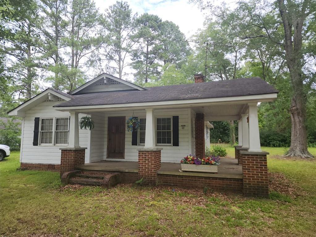 Photo one of 5015 Suwanee Dam Rd Suwanee GA 30024 | MLS 7433915F