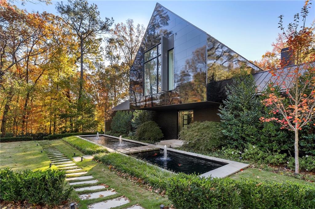 Photo one of 2716 Ridgewood Nw Rd Atlanta GA 30327 | MLS 7491093F