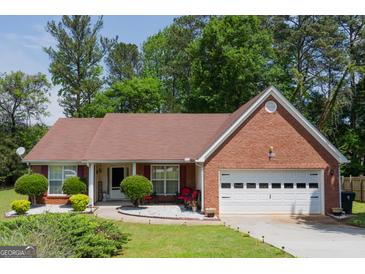 Photo one of 2100 Thorndale Sw Dr Lilburn GA 30047 | MLS 10286019