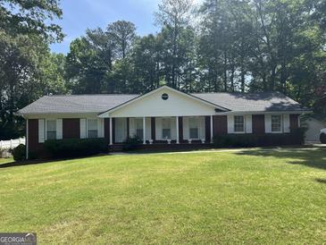 Photo one of 104 Hickory Ave Fayetteville GA 30215 | MLS 10295914