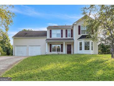 Two-story house with attached two car garage at 3405 Cascade Trl, Villa Rica, GA 30180