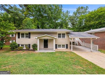 Ranch-style brick home with carport at 78 Candlelight Ln, Atlanta, GA 30331