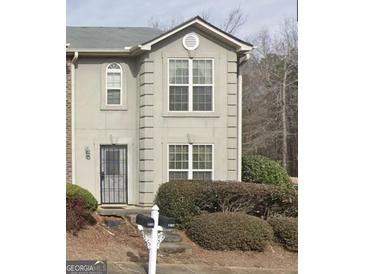 Two story townhome with neutral color exterior at 4403 Pinscher St, Union City, GA 30291