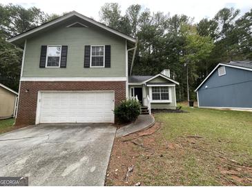 Photo one of 1937 Marbut Forest Dr Lithonia GA 30058 | MLS 10389265