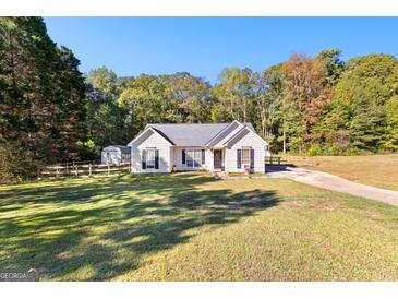 Photo one of 31 Saint James Ct Sharpsburg GA 30277 | MLS 10399568