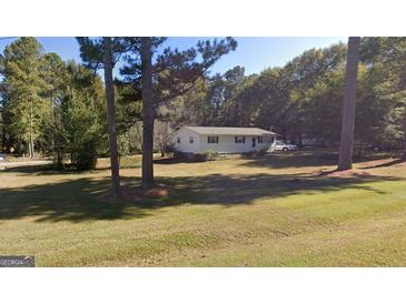 Photo one of 3062 Sunset Se Rd Conyers GA 30094 | MLS 10402355