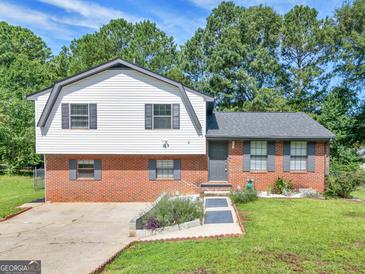 Photo one of 5893 Nell Ln Ellenwood GA 30294 | MLS 10409755