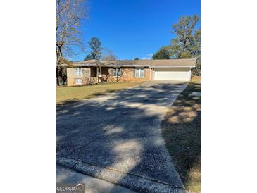 Ranch home with attached garage and large yard at 5003 Pineview Ter, Fayetteville, GA 30214