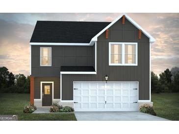 Two-story house with gray siding, white garage door, and orange accents at 145 Weldon St # 59, Mcdonough, GA 30253