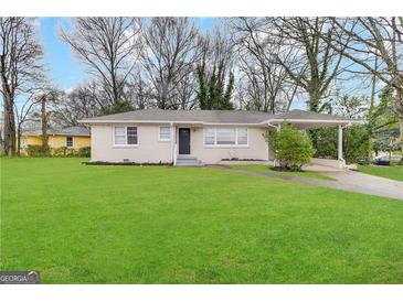 Updated Ranch home with a large front yard and carport at 2390 Candler Rd, Decatur, GA 30032