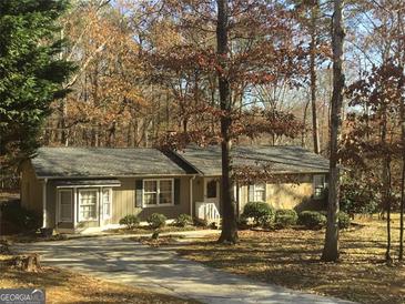 Charming single story home with stone accents and a well-maintained front yard at 3594 Broxton Ln, Snellville, GA 30039