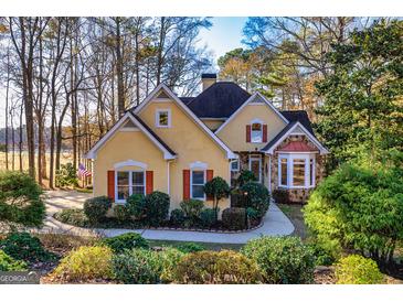 Beautiful two-story home with stone accents and landscaping at 816 Teal Vista, Peachtree City, GA 30269