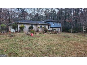 Photo one of 612 Mincey Woods Ct Stone Mountain GA 30087 | MLS 20161064