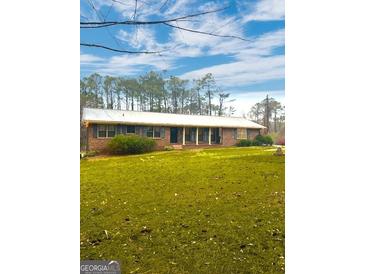 Photo one of 2563 Young Rd Stone Mountain GA 30088 | MLS 20175073