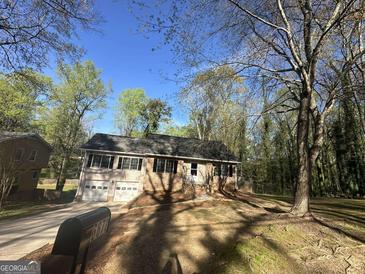 Photo one of 6672 Pleasant Valley Dr Morrow GA 30260 | MLS 20177203
