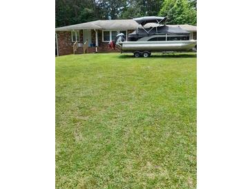 Photo one of 902 Highway 314 Fayetteville GA 30214 | MLS 7224398