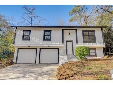 Photo one of 3929 Valley Brook Rd Snellville GA 30039 | MLS 7322417