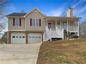 Two-story house with two-car garage and porch at 47 Makayla Way, Temple, GA 30179