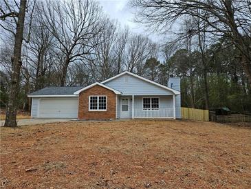 Photo one of 225 E Country Woods Dr Covington GA 30016 | MLS 7344640