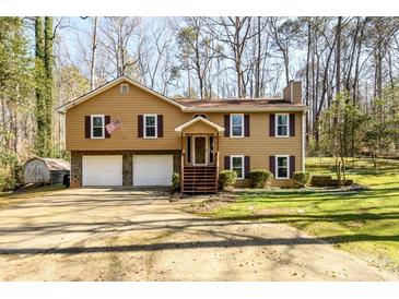 Photo one of 5325 Oaks Landing Ct Sugar Hill GA 30518 | MLS 7353390